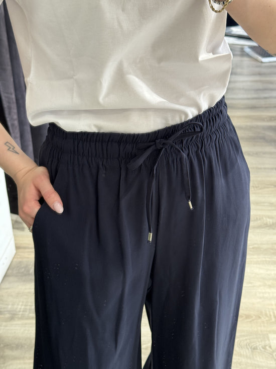 Pantalone gamba ampia con elastico in vita e coulisse Tensione In