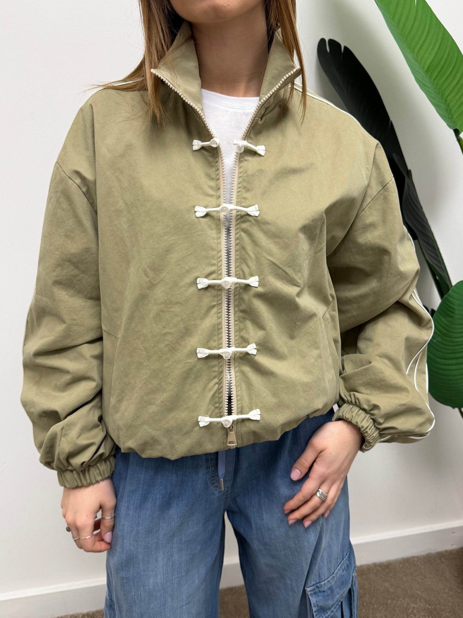 Giacca con zip ed alamari Tensione In - GiuGiò | Shop online