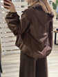 Giubbino in tessuto impermeabile con cappuccio Tensione IN - GiuGiò | Shop online