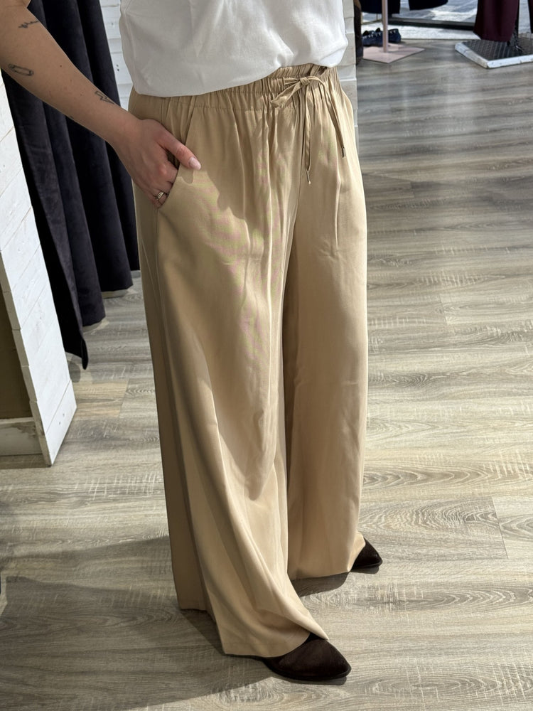 Pantalone gamba ampia con elastico in vita e coulisse Tensione In - GiuGiò | Shop online