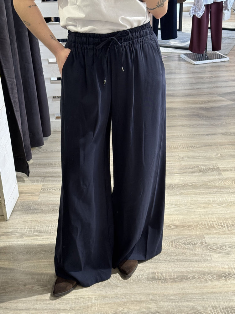 Pantalone gamba ampia con elastico in vita e coulisse Tensione In - GiuGiò | Shop online